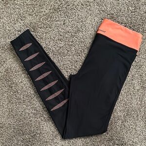 Under Armour Black and Orange Leggings